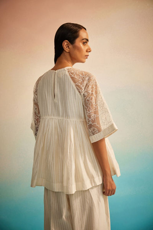 Ami Jaal ivory raglan top