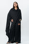 Black draped shirt with flared trouser pants