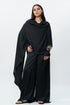 Black draped shirt with flared trouser pants