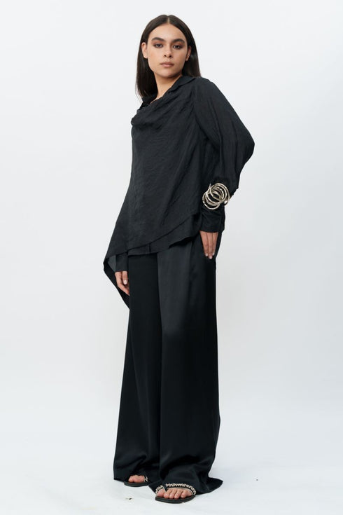 Black draped shirt with flared trouser pants