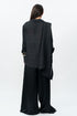 Black draped shirt with flared trouser pants