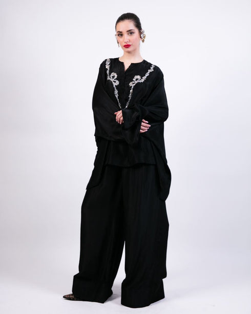 Black short boxy kurta with black flared pants