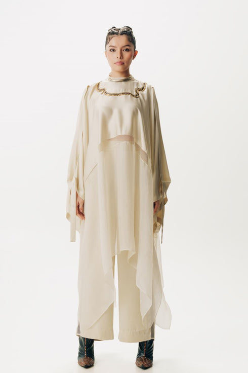 Cream cape with trouser