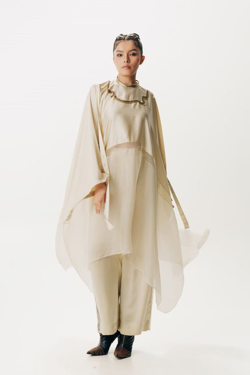 Cream cape with trouser