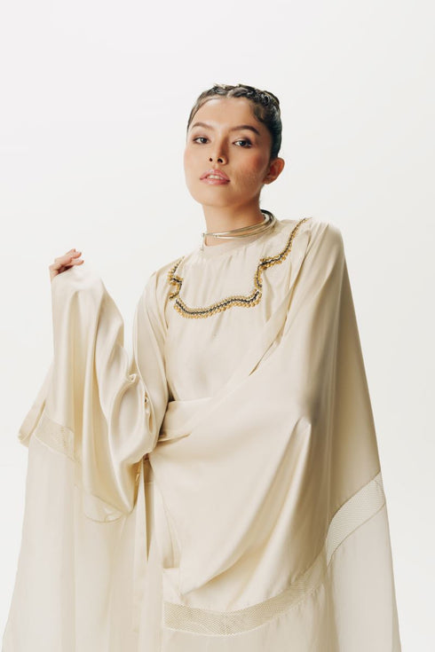 Cream cape with trouser