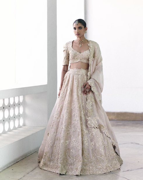 Dakshyani ivory lehenga set