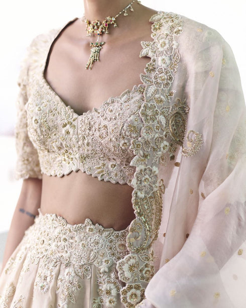 Dakshyani ivory lehenga set