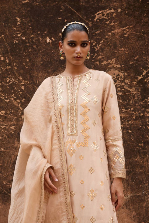 Haldi Nashpal beige chanderi copper geometric gota kurta set