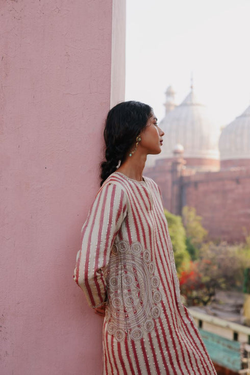 Halfmoon cream and red dress