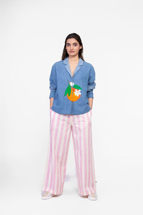 Soft denim top with embroidered patch