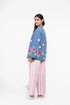 Soft denim coat with embroidered floral motifs