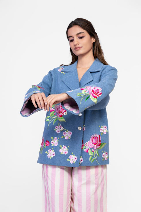 Soft denim coat with embroidered floral motifs