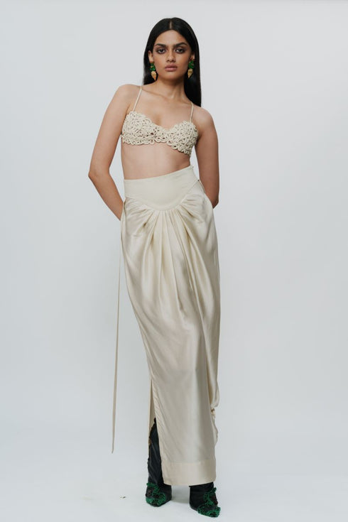 Ivory draped knotted skirt with cord waist