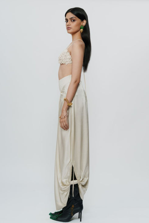 Ivory draped knotted skirt with cord waist