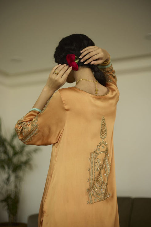 Maitreyi orange palm kurta set