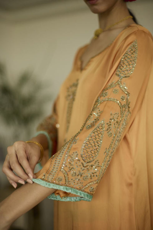 Maitreyi orange palm kurta set