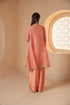 Mehrang peach short pheran kurta set