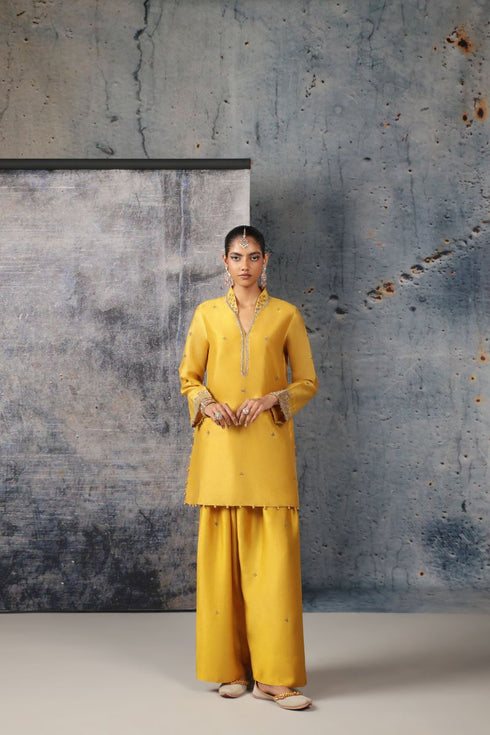 Mehrang yellow short buti kurta set