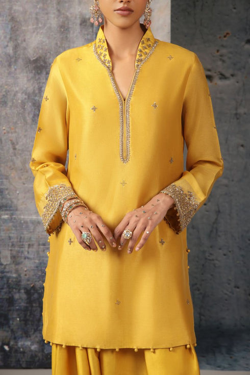 Mehrang yellow short buti kurta set