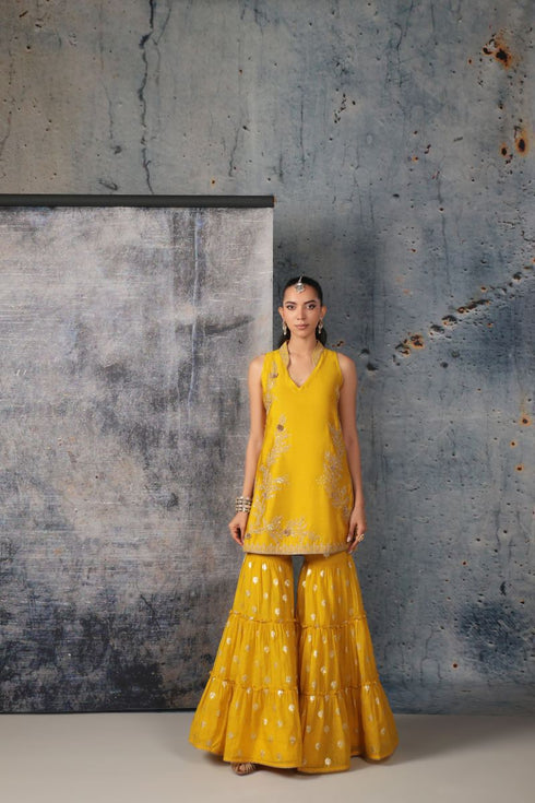 Mehrang yellow sleeveless sharara set