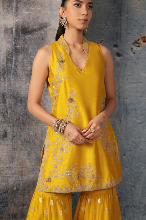 Mehrang yellow sleeveless sharara set