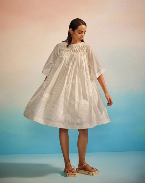 Musubi ivory smocking dress