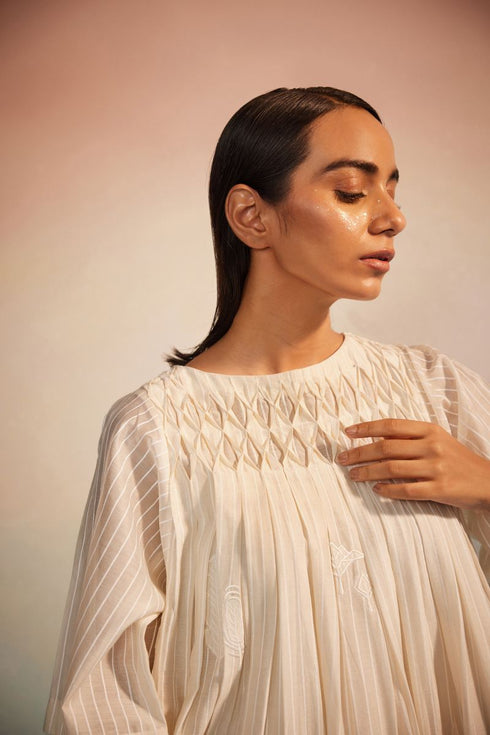 Musubi ivory smocking dress