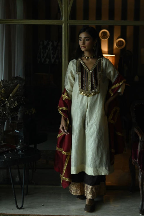 Noor chai beige banjara kurta with brown farshi pants