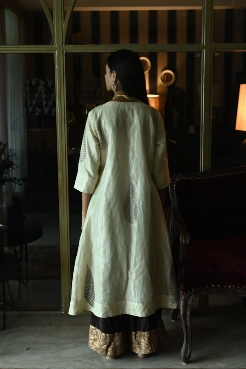 Noor chai beige banjara kurta with brown farshi pants