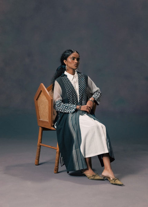 Resonance indigo jacket with ivory tunic and pants