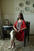Roshnee red cape with beige dhoti pants