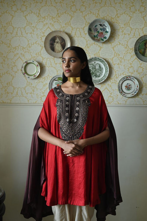 Roshnee red cape with beige dhoti pants
