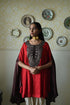 Roshnee red cape with beige dhoti pants
