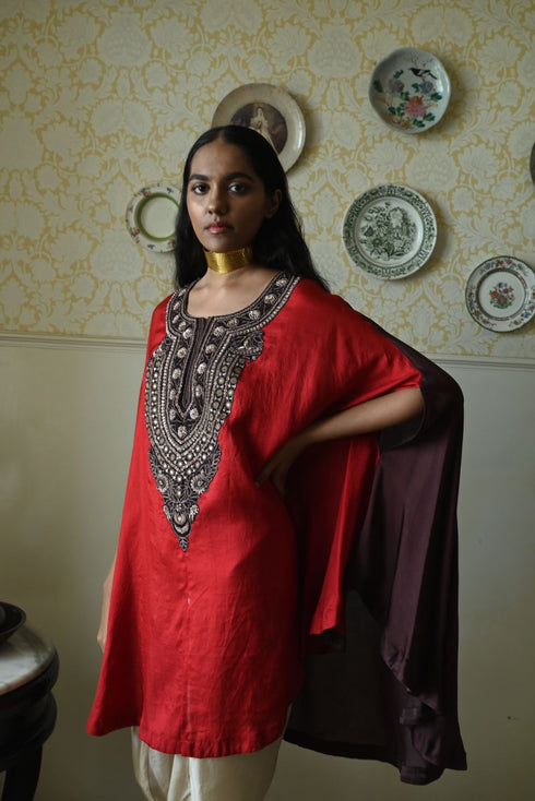 Roshnee red cape with beige dhoti pants