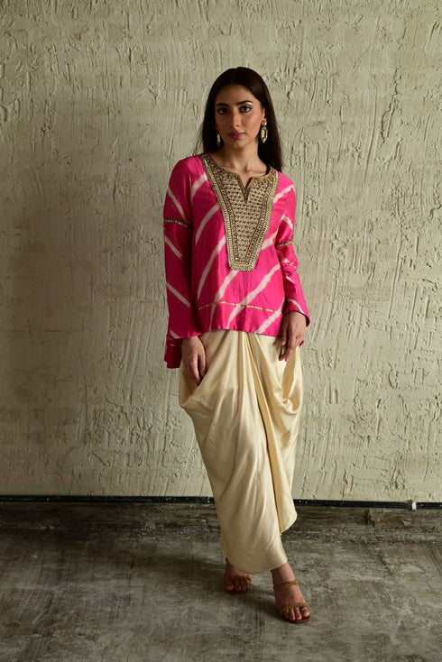 Shabana pink leheriya top with ivory cowl skirt