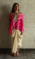 Shabana pink leheriya top with ivory cowl skirt