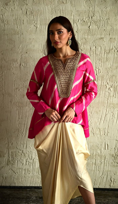 Shabana pink leheriya top with ivory cowl skirt