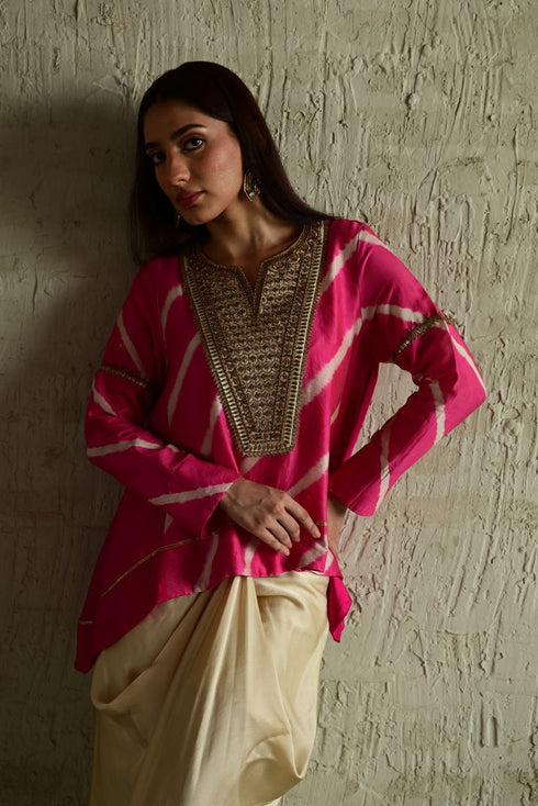 Shabana pink leheriya top with ivory cowl skirt