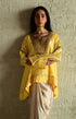 Shabana yellow leheriya top with ivory cowl skirt