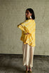 Shabana yellow leheriya top with ivory cowl skirt