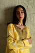 Shabana yellow leheriya top with ivory cowl skirt