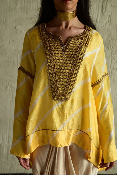 Shabana yellow leheriya top with ivory cowl skirt
