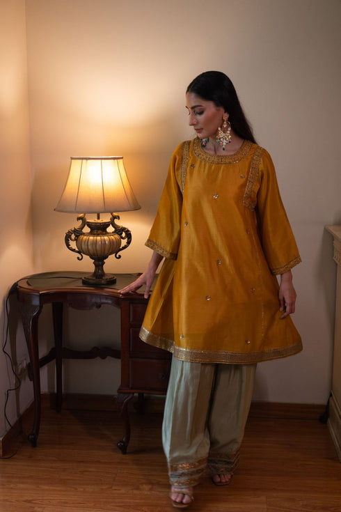 Shalimar Bagh yellow sufi choga with pista green paki salwar