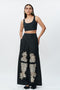 Shredded black cotton pants with mirrorwork