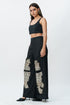Shredded black cotton pants with mirrorwork