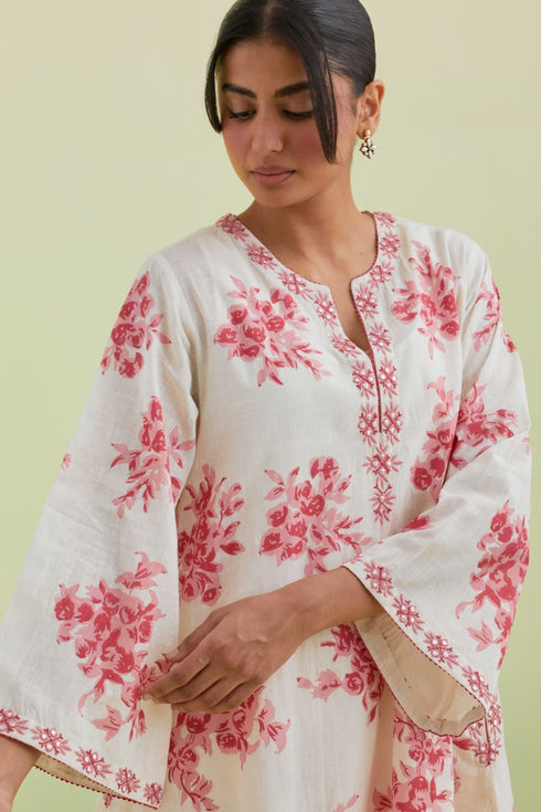 Sneha pink and off-white A-line short kurta set