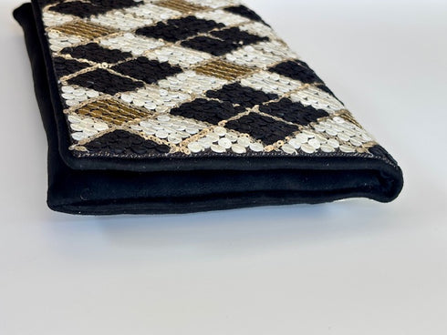The Argyle black clutch