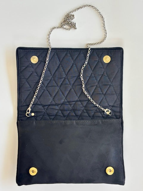 The Argyle black clutch