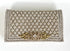 The pique silver clutch