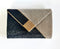 The saarinen black and silver clutch